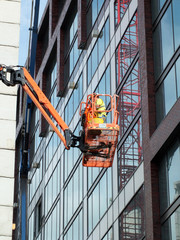 construction worker on an elevated platform