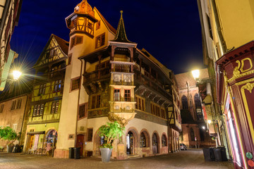 Night view of a street of the alsatian town of Colmar, in France