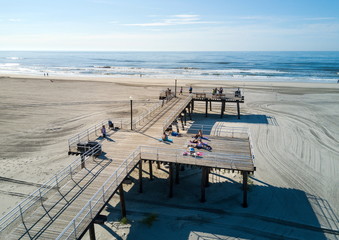 WILDWOOD, NEW JERSEY, USA - June 25, 2017: Crest beach and wooden dock from above with the ocean...