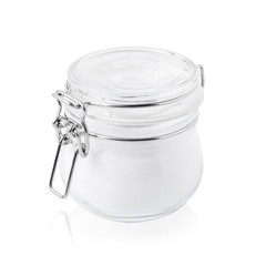 glass jar with sugar, closed, isolated on white