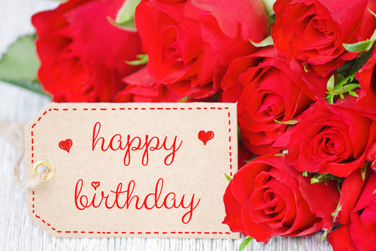 birthday card red roses and a label with text happy birthday