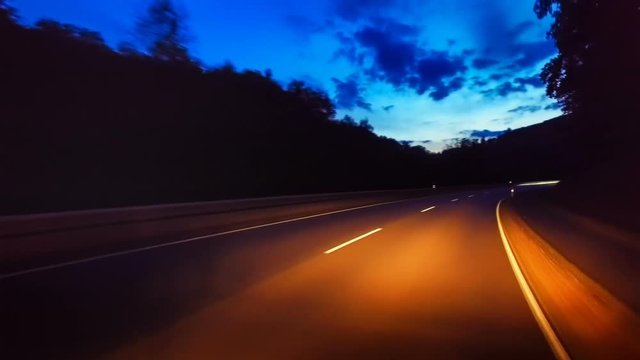 Driving on highway at spectacular summer sunset. Full HD
