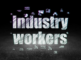 Manufacuring concept: Industry Workers in grunge dark room