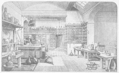 English Scientist Michael Faraday in his Laboratory. Date: circa 1820s