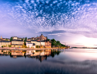 Fototapeta premium Scenic Stockholm City Old Town Sunset Skyline. Panoramic montage from 12 images