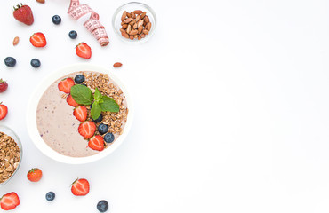 Diet concept frame porridge, nuts, fresh berries. Top view. Copy space