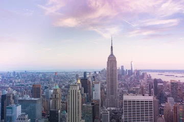 Tuinposter Sunset view  New York City from midtown Manhattan © littleny