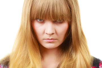 Angry looking woman, face covered in fringe