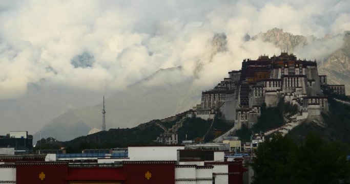 4k Potala Palace in the morning,mountains surrounded by clouds.