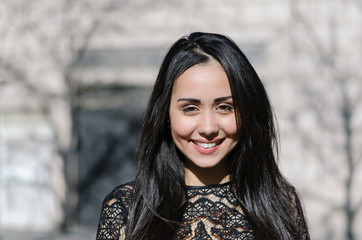 young beautiful woman model smiling looking at the camera portrait close up