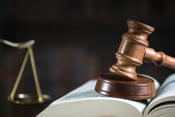 Symbol of law and justice. Concept law and justice. Scales of justice, gavel and book.