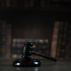 Symbol of law and justice. Concept law and justice. Scales of justice, gavel and book.