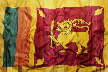 National flag of Sri Lanka, wooden background