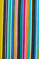 Colored striped cotton background. Patterned multicolor material as wallpaper. Material for colorful handbag.