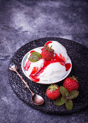 Ice cream with strawberry topping