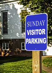 Obraz premium Sunday Church Visitor Parking Sign