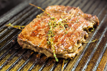 closeup of a steak on grill