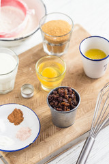 Baking ingredients on white wooden table