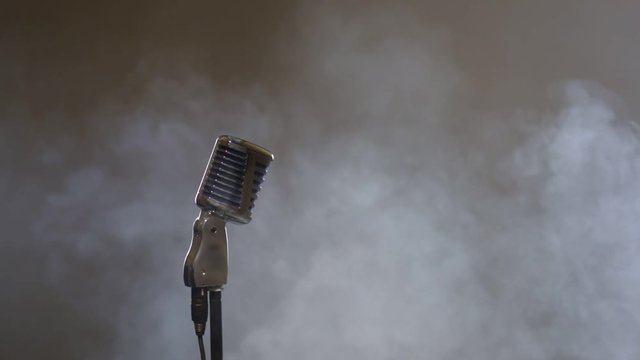 Microphone in clouds of smoke