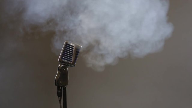 Microphone in clouds of smoke