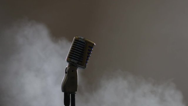 microphone on stage with smoke