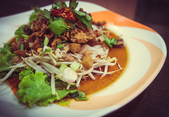 Close-up Noodle tube, with vegetables and in noodle tube on the dish