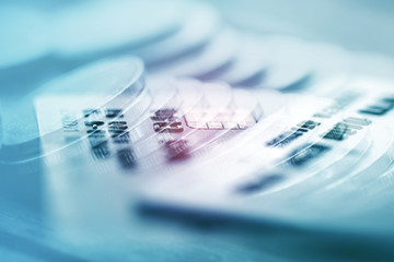 Double exposure Rows of coins of Credit cards on the table,finance and business concept,Money,soft...