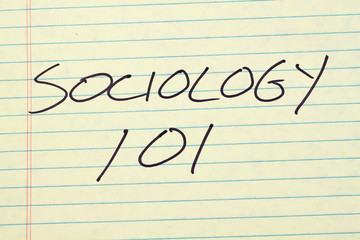 The words "Sociology 101" on a yellow legal pad