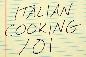 The words "Italian Cooking 101" on a yellow legal pad