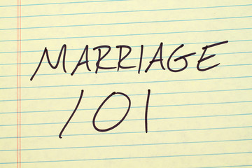 The words "Marriage 101" on a yellow legal pad