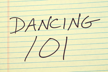 The words "Dancing 101" on a yellow legal pad