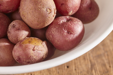 a bowl of boiled red potatoes, sometimes called "new potatoes"