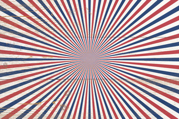 wooden planks painted with red and blue radial stripes