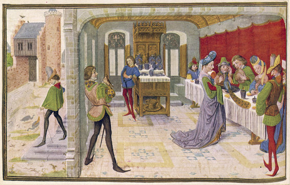 People at a medieval banquet. Date: medieval