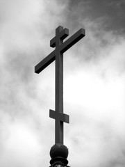 orthodox eight-pointed Russian cross/photography with scene of the orthodox cross on background sky in monochrome scene