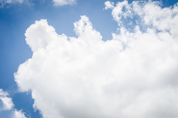 Looking up at big cloud blue sky