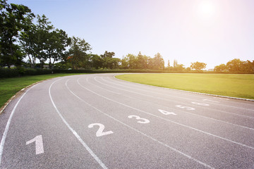 Gray treadmill at the stadium with the numbering from one to eight