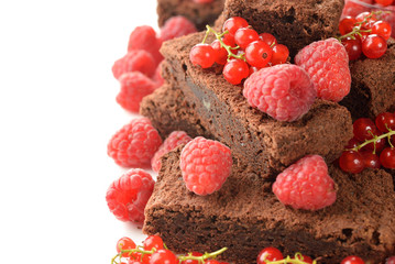 Chocolate brownies with raspberries and currants