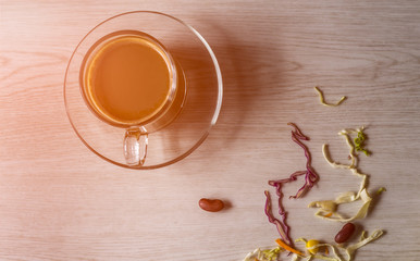 Coffee cup and  vegetables salad on wooden background.