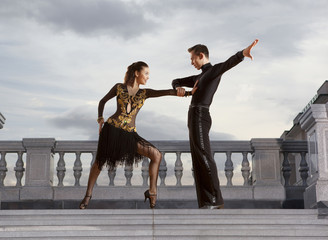 Obraz na płótnie Canvas Pair of dancers dancing ballroom