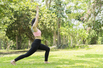 beautiful woman relax yoga in the park, yoga concept, healty concept