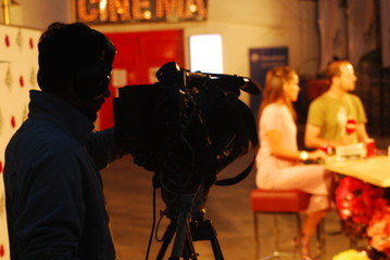 TV Journalist on a field