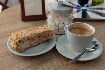A cup of coffee and cake for a business lunch