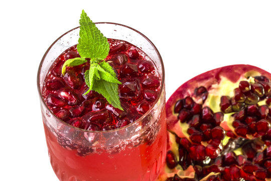 Enriched with useful delicious pomegranate juice in a glass