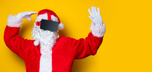 Funny Santa Claus have a joy with VR glasses