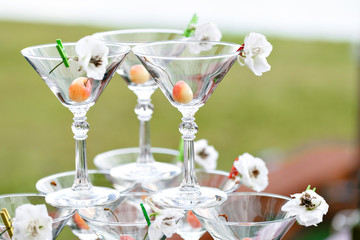 Champagne tower ready to spill alcohol