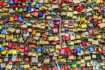 Fototapeta premium Many Padlocks on Fence on Iron Fence