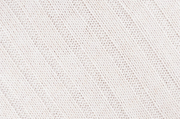 White soft knitted fabric texture with strips wale.