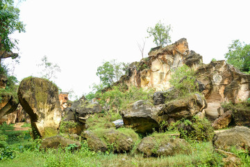 The exploitation of limestone hills canyon forming a unique architectural in Arosbaya Hill Madura...