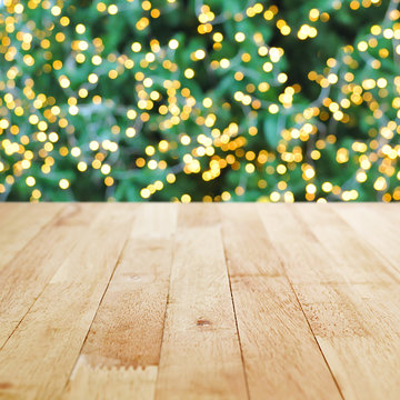 Wood Table Top On Green Christmas Tree Bokeh Background